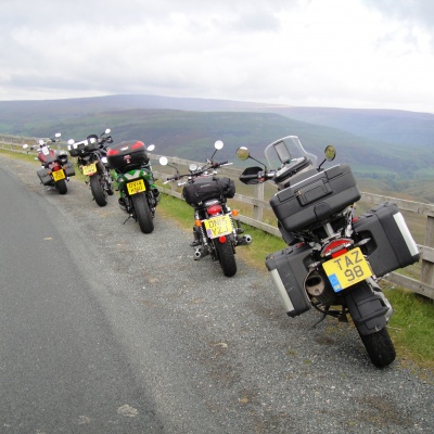 Motorbikes on sea cliff